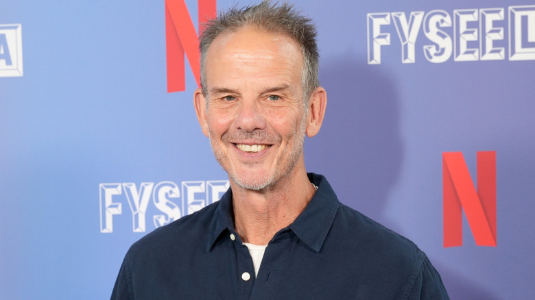 Peter Berg smiling at the Netflix FYSEE: Action Night at Netflix Tudum Theater in May 2025.