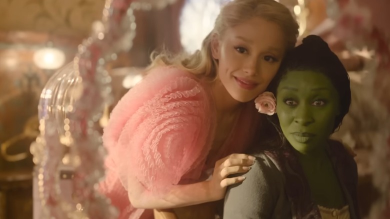 Elphaba and Glinda looking in a mirror together in Wicked (2024)