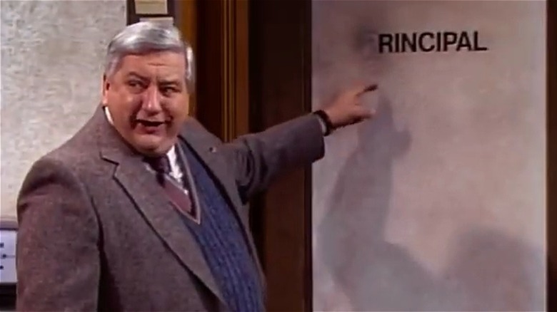 Principal Dr. Harold Samuels pointing at his door in "Head of the Class"