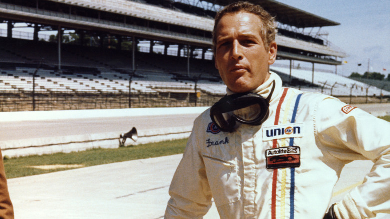 Frank Capua stands on a racetrack in "Winning" (1969)