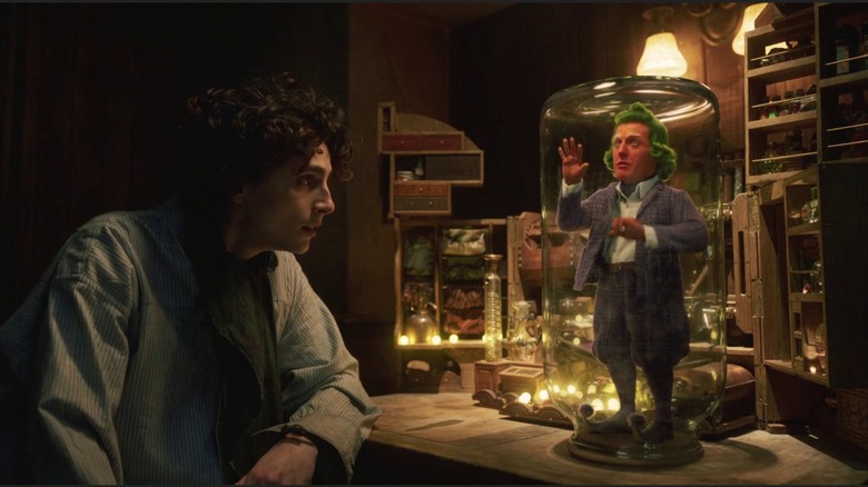 Wonka talking to Lofty in "Wonka" (2024)
