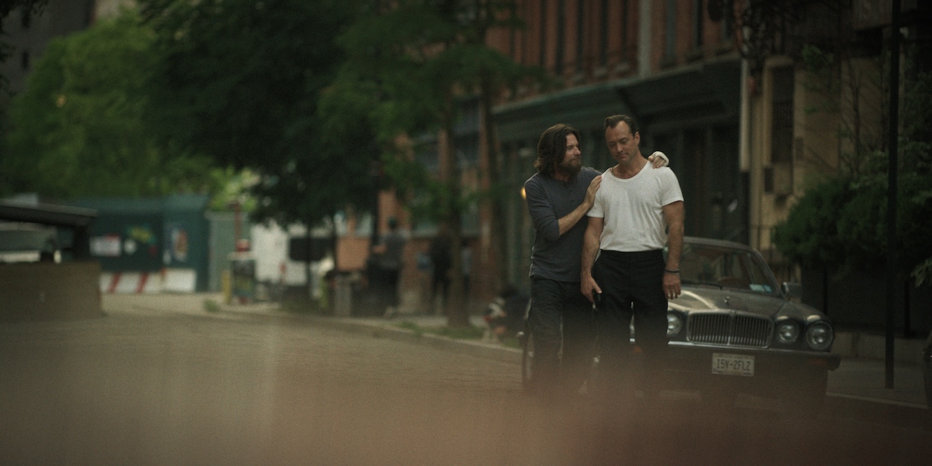 Black Rabbit stars Jason Bateman as Vince, Jude Law as Jake, shown here standing in the street, bucking each other up