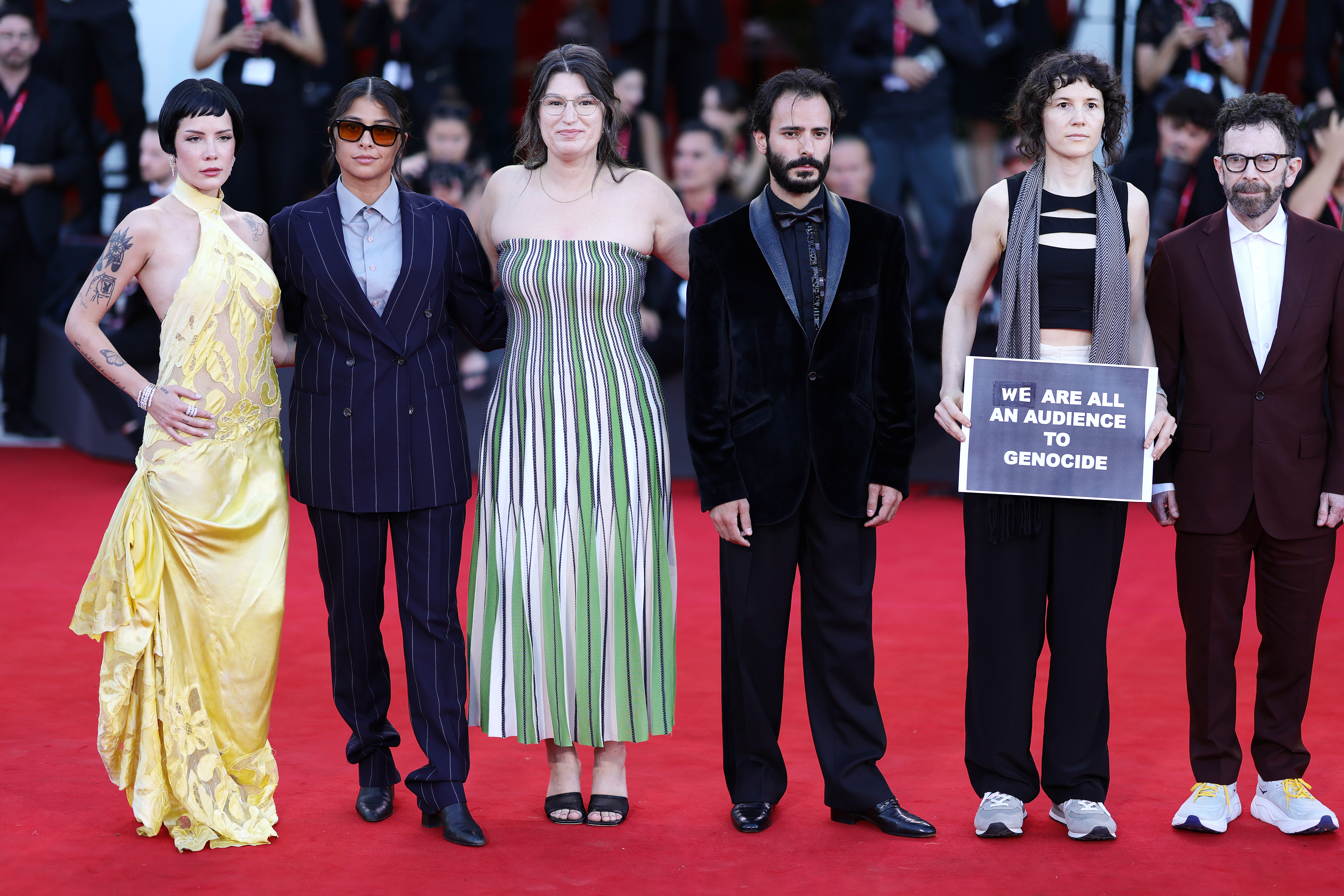 VENICE, ITALY - SEPTEMBER 01: (L-R) Halsey, Isabelle Deluce, Emily McCann Lesser, Josef Akiki, Eva H.D. and Charlie Kaufman attend "The Smashing Machine" red carpet during the 82nd Venice International Film Festival on September 01, 2025 in Venice, Italy. (Photo by Andreas Rentz/Getty Images)
