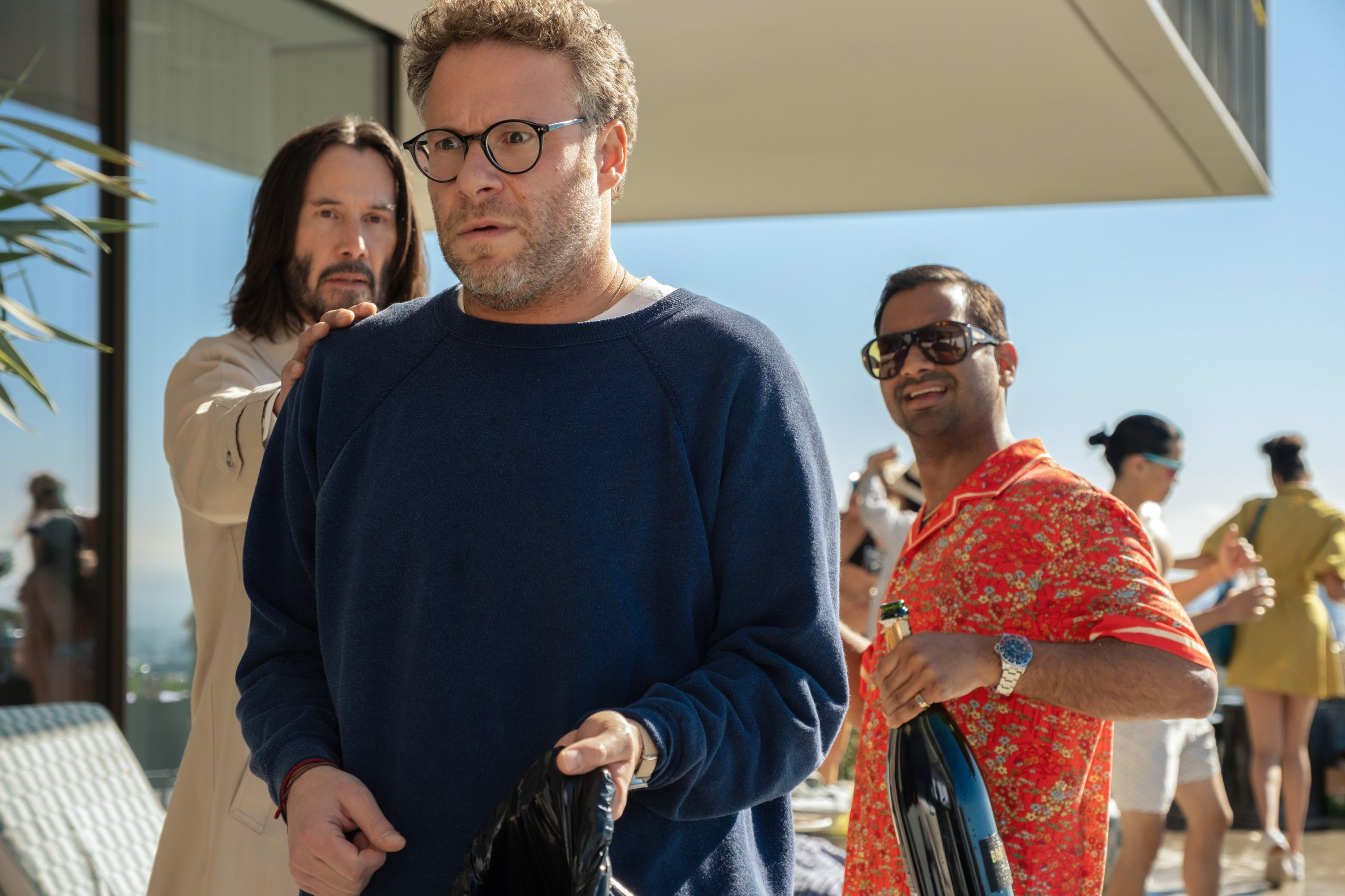GOOD FORTUNE, from left: Keanu Reeves, Seth Rogen, Aziz Ansari, 2025. ph: Eddy Chen /© Lionsgate /Courtesy Everett Collection