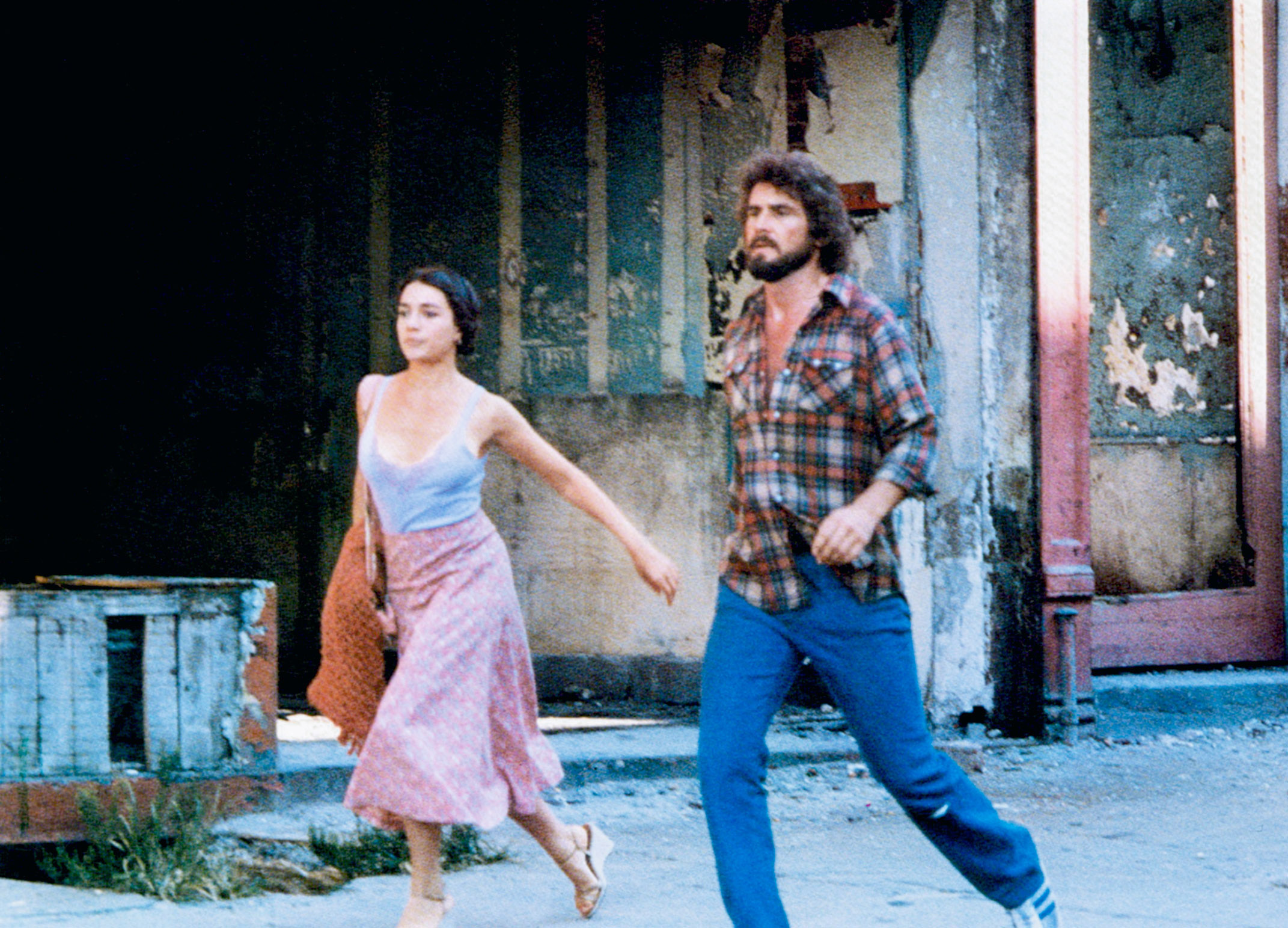 NIGHT OF THE JUGGLER, from left: Julie Carmen, James Brolin, 1980. ©Columbia Pictures/Courtesy Everett Collection