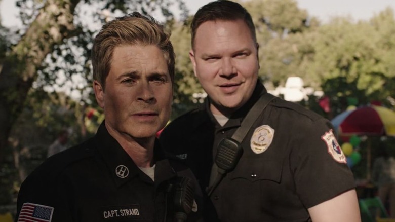 Owen and Judd watching something in 911 Lone Star (2020 - 2025)