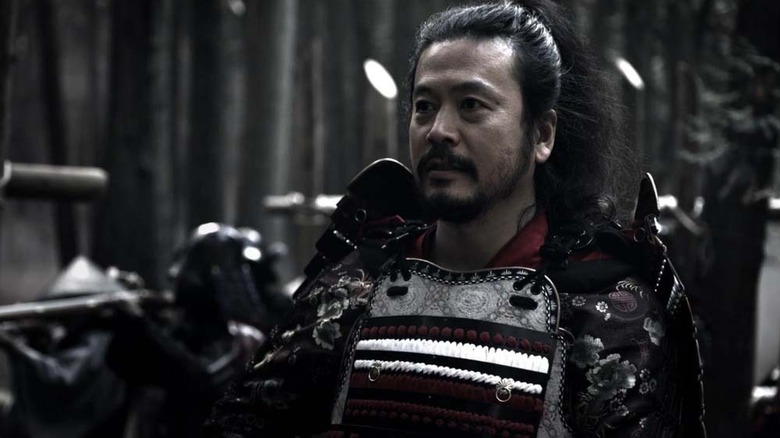 A Japanese warlord stands on a battlefield on Age of Samurai: Battle for Japan