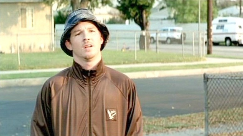 Elvis standing outside in "Alpha Dog."