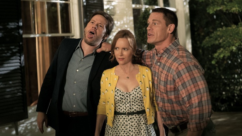 Mitchell grabs Lisa and Hunter in "Blockers" (2018)