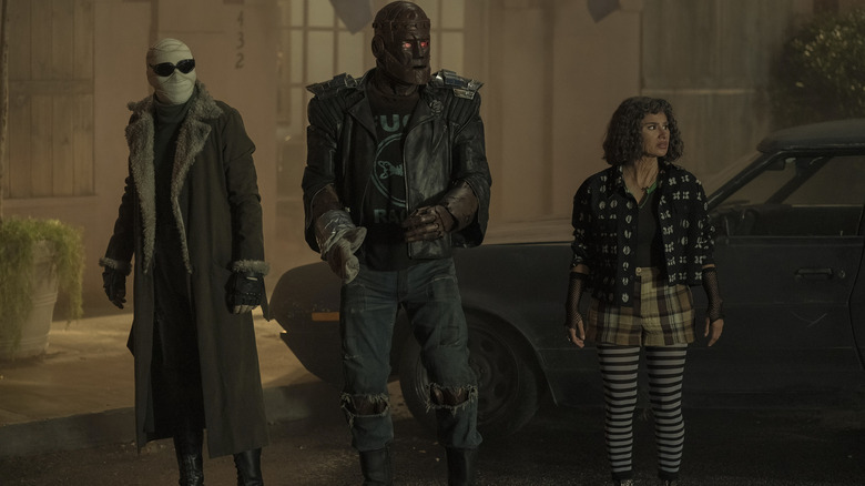 Negative Man, Robotman, and Jane next to a car on "Doom Patrol" (2019-2023)