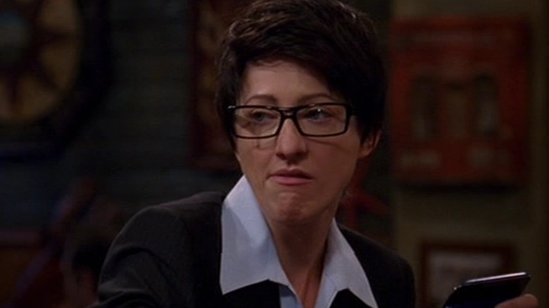 Danny smirks at Alan in "Two and a Half Men" (2003-2015)