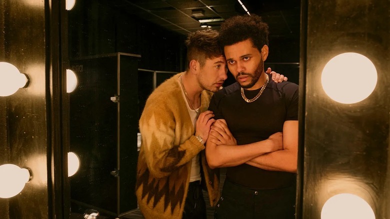 Lee comforting Abel Tesfaye in "Hurry Up Tomorrow" (2025)