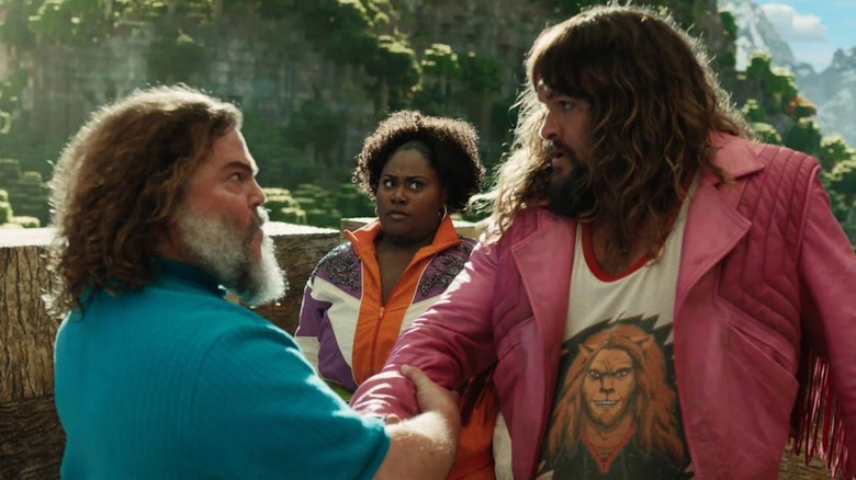 Steve and Garrett shake hands in the Overworld in "A Minecraft Movie" (2025)
