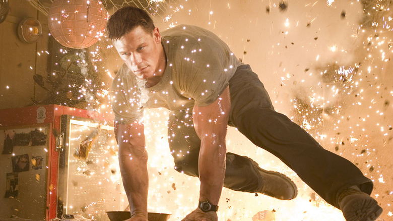 John Triton looking cool jumping away from an explosion in The Marine (2006)