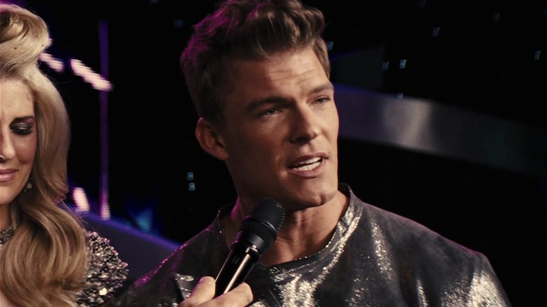 Gloss giving an interview next to Cashmere in Catching Fire