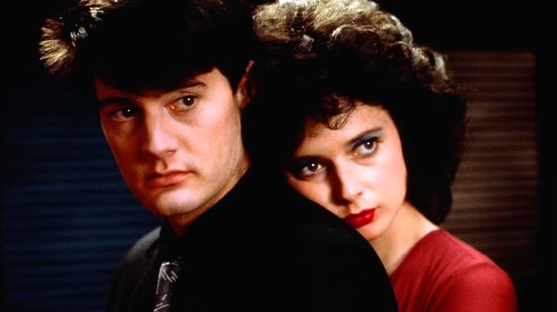 Dorothy hugs Jeffrey in Blue Velvet (1986)