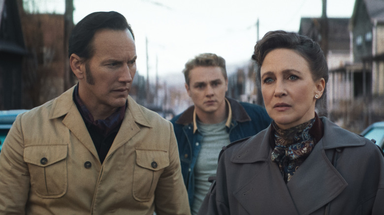 Ed, Tony, and Lorraine outside the Smurl house in "The Conjuring: Last Rites" (2025)