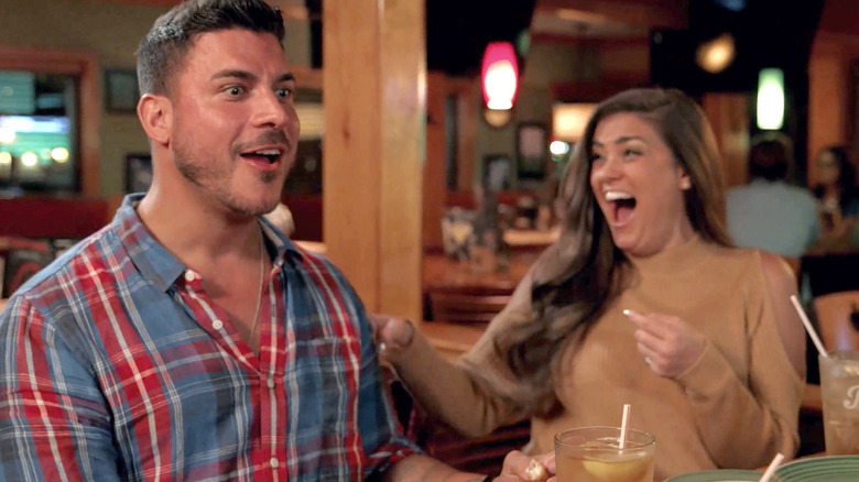 Brittany laughing at Jax in a restaurant in "Jax and Brittany Take Kentucky" (2017)