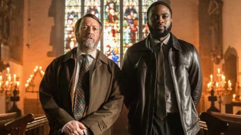 Russel and John/James in a church in "Ludwig"