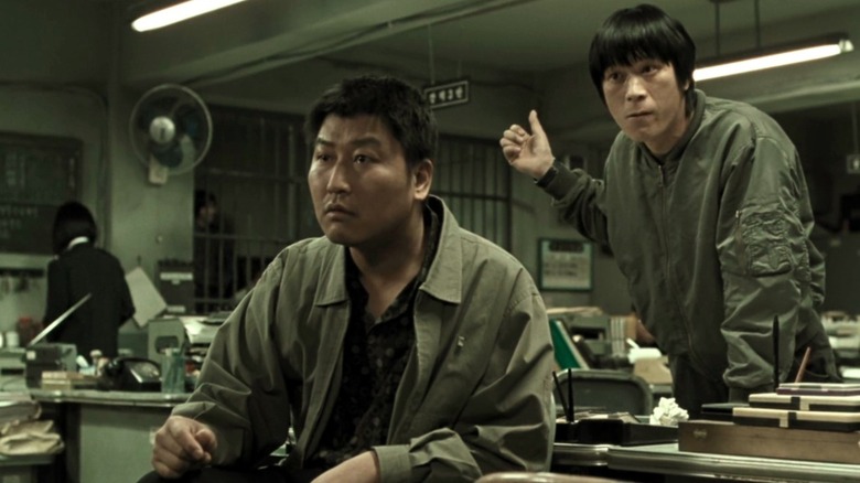 The detectives in the police station in Memories of Murder (2003)