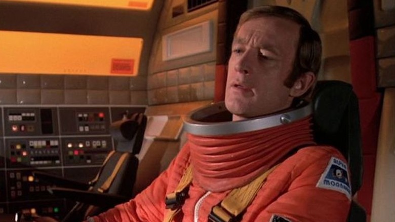 Carter sits in the pilot's seat in Space:1999