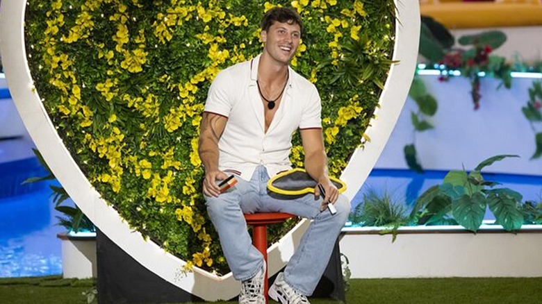 Rob Rausch grinning on "Love Island"