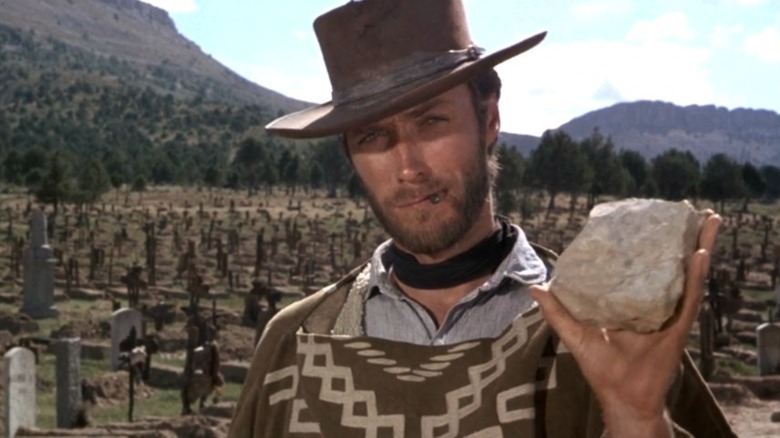 The Man With No Name holds a rock in The Good, The Bad and The Ugly (1966)
